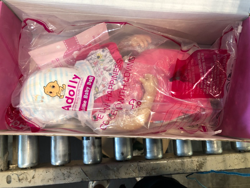 Photo 1 of Adolly Gallery Reborn Baby Dolls 22 Inch Real Life Big Realistic Newborn Baby Doll with Rooted Hair Eyes Open Cloth Body Gift Set for Kids AD22C13 Name Anna Pink Outfit1
