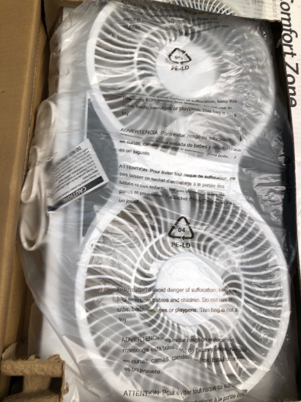 Photo 1 of Comfort Zone CZ310R Adjustable Width 3 Speed Dual Reversible Multi Functional Window Sill Fan with Remote Control and Removable Cover, White