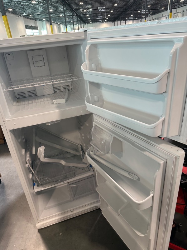 Photo 3 of Frigidaire FFTR2021TW 30 Inch Freestanding Top Freezer Refrigerator with 20.4 cu. ft. Total Capacity, 2 Glass Shelves, 5.1 cu. ft. Freezer Capacity, Right Hinge with Reversible Doors,Hinge in White