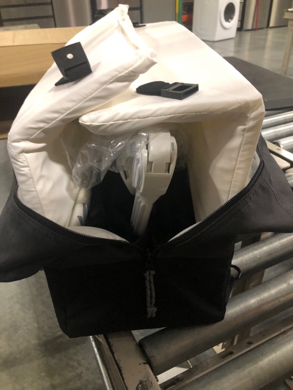 Photo 1 of Lotus Travel Crib - Backpack Portable, Lightweight, Easy to Pack Play-Yard with Comfortable Mattress - Certified Baby Safe