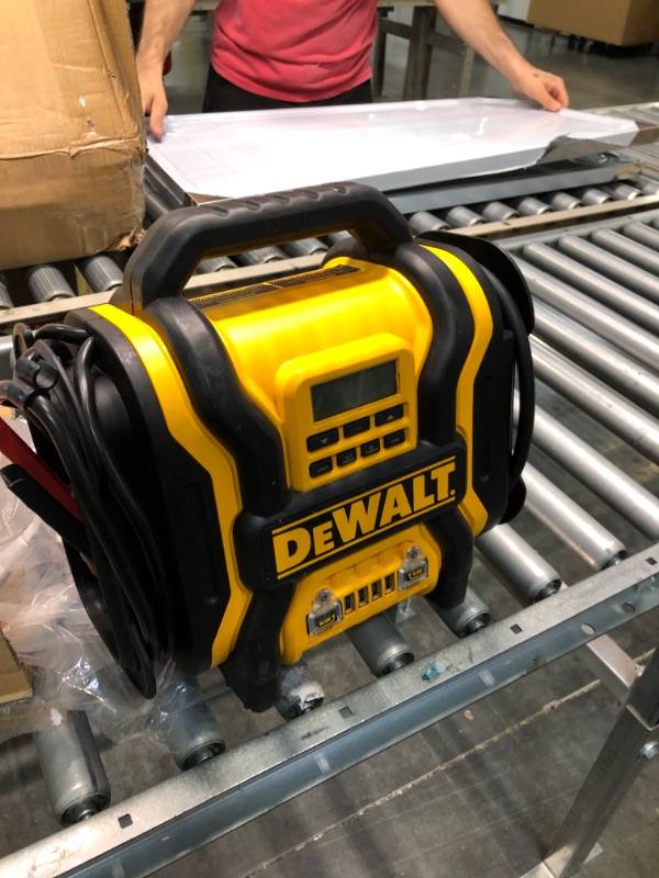 Photo 1 of DEWALT DXAEPS14 1600 Peak Battery Amp 12V Automotive Jump Starter/Power Station with 500 Watt AC Power Inverter, 120 PSI Digital Compressor, and USB Power , Yellow