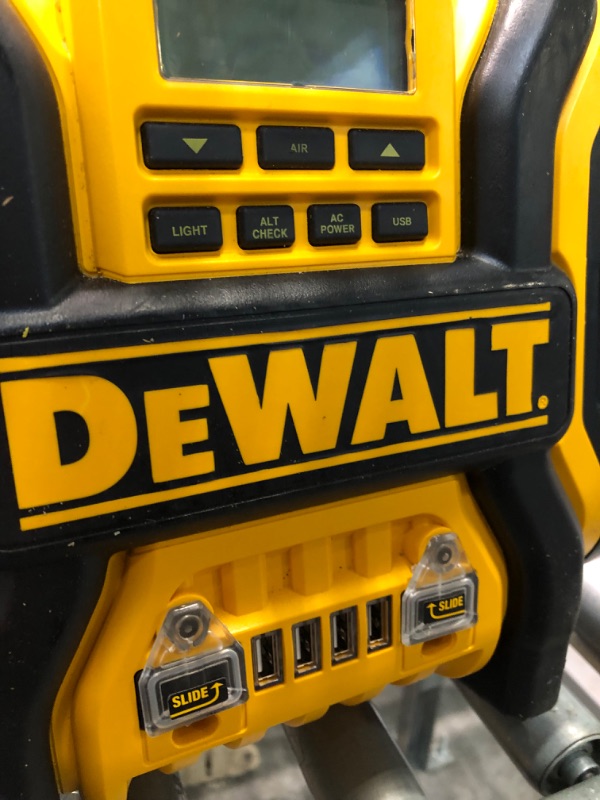 Photo 1 of DEWALT DXAEPS14 1600 Peak Battery Amp 12V Automotive Jump Starter/Power Station with 500 Watt AC Power Inverter, 120 PSI Digital Compressor, and USB Power , Yellow