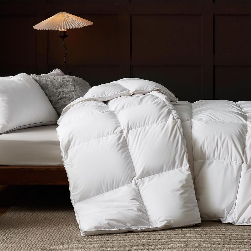 Photo 1 of Bedsure Premium Down Comforter King Size, Luxurious High-Loft White Down Duvet Insert for All Seasons, Storage Bag & 8 Corner Tabs, Machine Washable, 54 Oz Fluffy Medium Warmth (106x90 Inches)