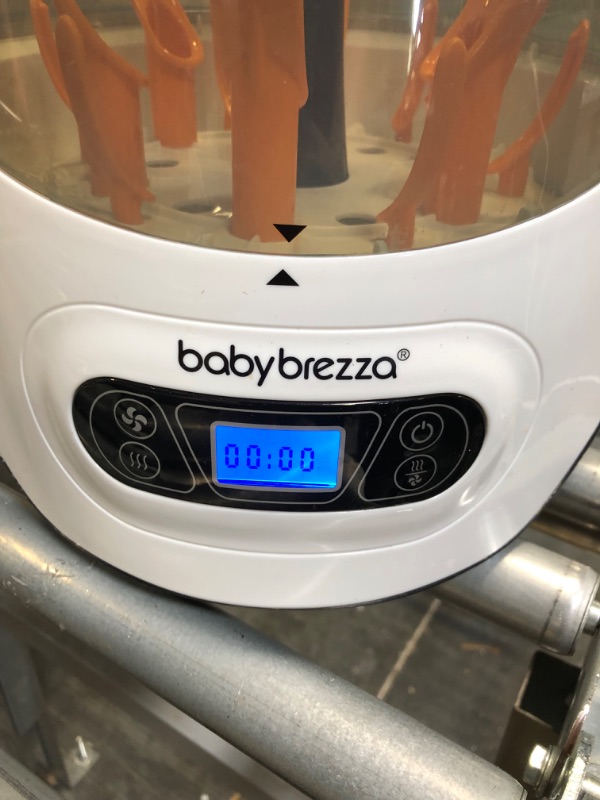 Photo 5 of Baby Brezza Baby Bottle Sterilizer and Dryer Machine – Electric Steam Sterilization - Universal Fit - Pacifiers, Glass, Plastic, and Newborn Feeding Bottles
