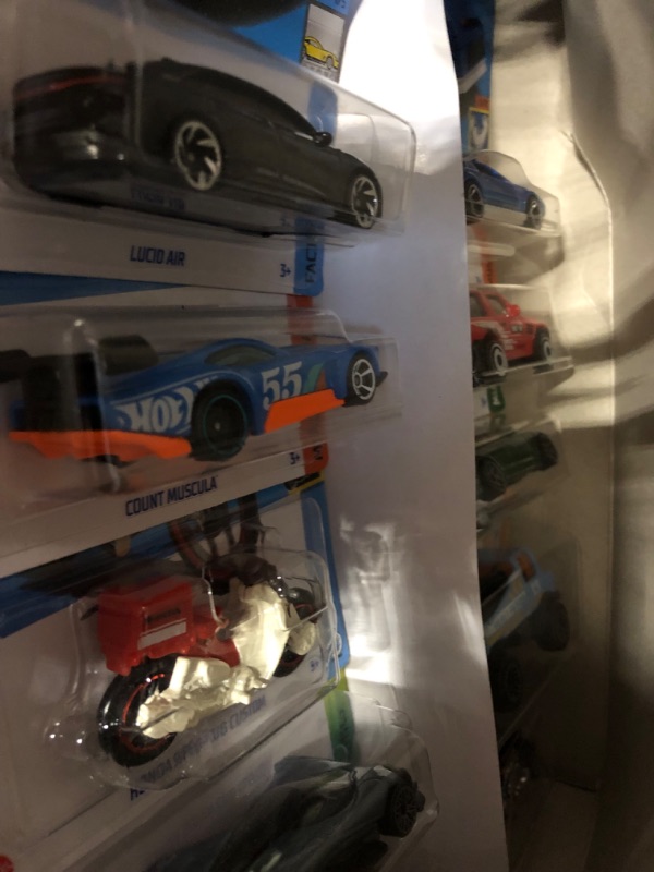 Photo 2 of Hot Wheels Basics Black Box, 16 First-Appearance Toy Cars in 1:64 Scale, Possibly Includes a Treasure Hunt Car, Toy for Collectors & Kids 3 Years Old & Older Box I