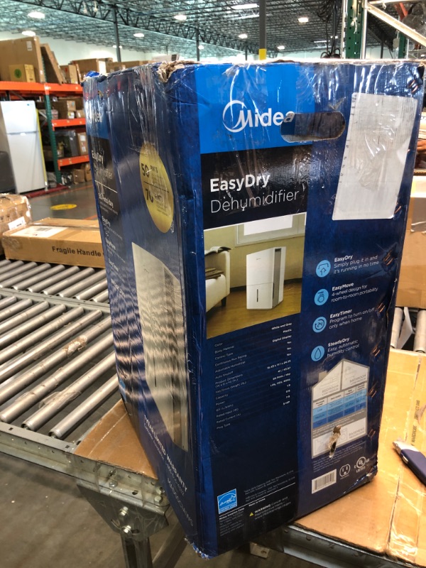 Photo 3 of Midea 4,500 Sq. Ft. Energy Star Certified Dehumidifier With Reusable Air Filter 50 Pint 2019 DOE (Previously 70 Pint) - Ideal For Basements, Large & Medium Sized Rooms, And Bathrooms (White) Standard 4,500 Sq. Ft.