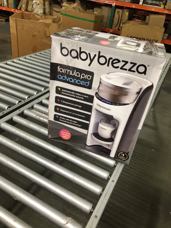 Photo 1 of New and Improved Baby Brezza Formula Pro Advanced Formula Dispenser Machine - Automatically Mix a Warm Formula Bottle Instantly - Easily Make Bottle with Automatic Powder Blending