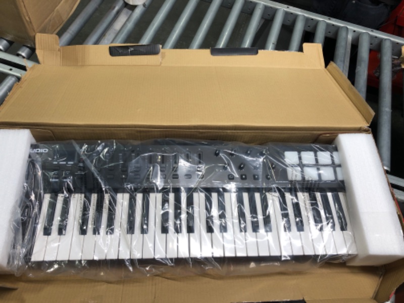 Photo 1 of MIDI Controller Bundle - 49 Key USB MIDI Keyboard with Beat Pads, Studio Headphones and Production Software - M-Audio Oxygen 49 MKV and HDH40 49 Keys with Studio Headphones