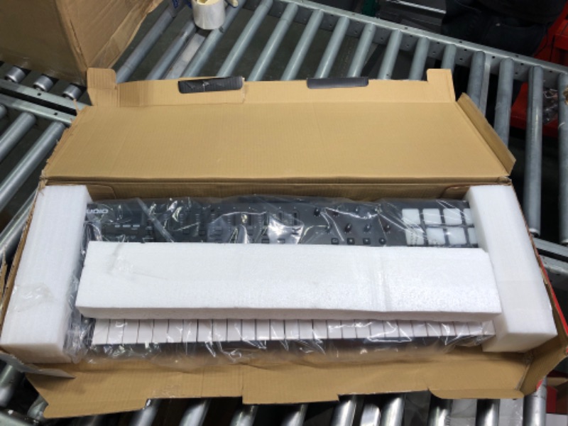 Photo 1 of MIDI Controller Bundle - 49 Key USB MIDI Keyboard with Beat Pads, Studio Headphones and Production Software - M-Audio Oxygen 49 MKV and HDH40 49 Keys with Studio Headphones