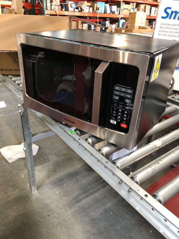 Photo 1 of TOSHIBA EM131A5C-SS Countertop Microwave Oven, 1.2 Cu Ft with 12.4" Turntable, Smart Humidity Sensor with 12 Auto Menus, Mute Function & ECO Mode, Easy Clean Interior, Stainless Steel & 1100W Silver Microwave Oven