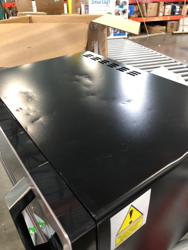 Photo 1 of TOSHIBA EM131A5C-SS Countertop Microwave Oven, 1.2 Cu Ft with 12.4" Turntable, Smart Humidity Sensor with 12 Auto Menus, Mute Function & ECO Mode, Easy Clean Interior, Stainless Steel & 1100W Silver Microwave Oven