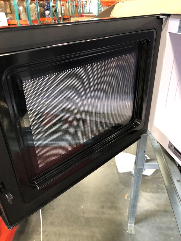 Photo 1 of TOSHIBA EM131A5C-SS Countertop Microwave Oven, 1.2 Cu Ft with 12.4" Turntable, Smart Humidity Sensor with 12 Auto Menus, Mute Function & ECO Mode, Easy Clean Interior, Stainless Steel & 1100W Silver Microwave Oven