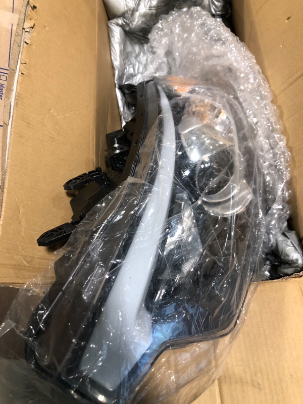 Photo 2 of ***ITEM IS CRACKED ON THE SIDE*** 

LIANDU-US Headlight Assembly Compatible with 2011 2012 2013Hyundai Elantra Left Driver Side Halogen Projector Headlight Headlamp Assembly Clear Lens Head Light Lamp Replacement