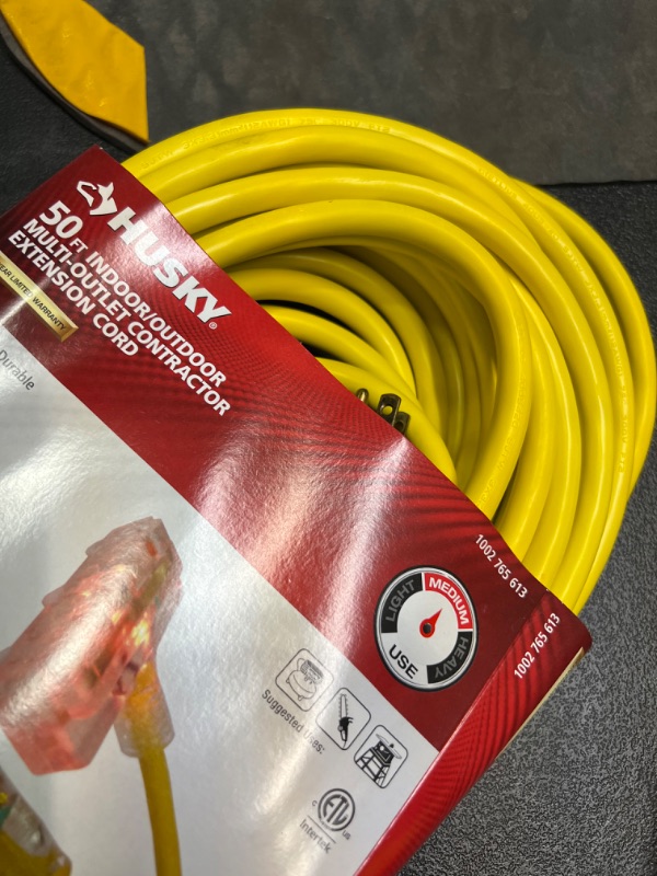 Photo 1 of Husky 50 ft. 12/3 Lighted Triple Tap Extension Cord
