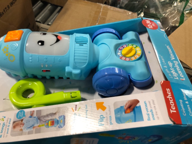 Photo 3 of Fisher-Price Laugh & Learn Toddler Toy Vacuum, Push Toy with Lights Music and Educational Songs, Light-Up Learning