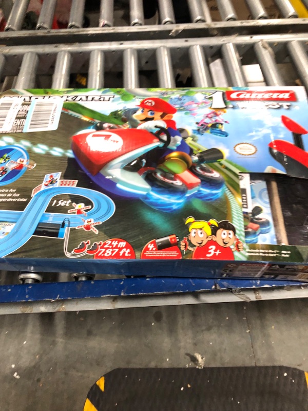 Photo 2 of Carrera First Mario Kart - Slot Car Race Track With Spinners - Includes 2 Cars: Mario and Yoshi - Battery-Powered Beginner Racing Set for Kids Ages 3 Years and Up Mario Kart w/ Spinners