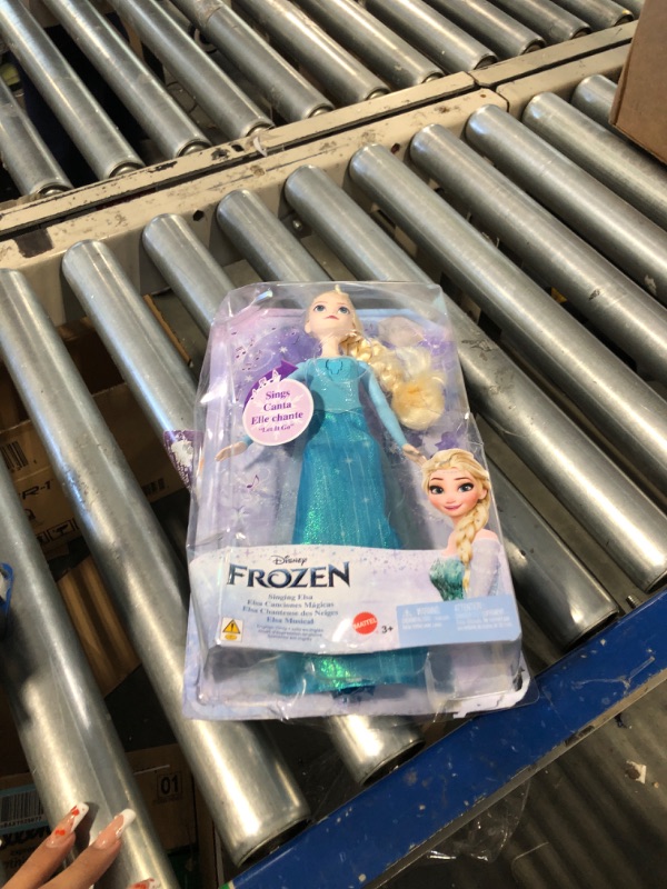 Photo 2 of Disney Frozen by Mattel Disney Frozen Toys, Singing Elsa Doll in Signature Clothing, Sings “Let It Go” from the Disney Movie Frozen