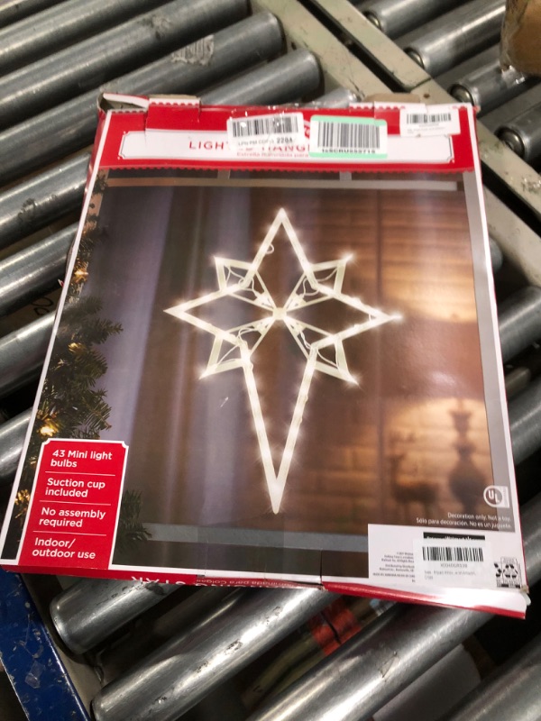 Photo 3 of 4.5 4.5 out of 5 stars 330 Reviews
Impact Innovations 22" Lighted Star of Bethlehem Christmas Window Silhouette Decoration ASIN: B000WZL5GQ View on Amazon, Cross