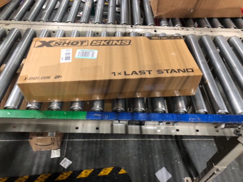 Photo 1 of XShot Skins Last Stand - Game Over 16 Darts by ZURU, X-Shot, Slam Fire, Auto Rotating Barrel, Toy Foam Blaster & Guns, Dart Blaster, Fun Gifts for Kids, Teens, Adults, Frustration Free Packaging Game Over Last Stand
