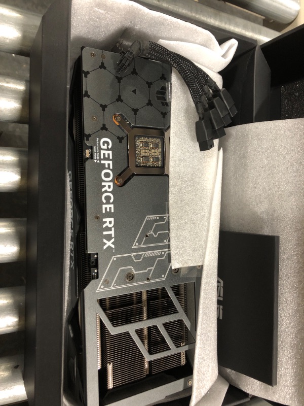 Photo 3 of ASUS TUF Gaming NVIDIA GeForce RTX 4090 OC Edition Gaming Graphics Card (24GB GDDR6X, PCIe 4.0, HDMI 2.1a, DisplayPort 1.4a, Dual Ball Bearing Axial Fans)
