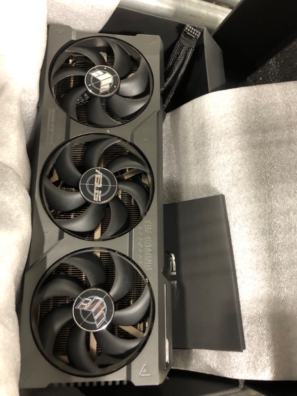 Photo 4 of ASUS TUF Gaming NVIDIA GeForce RTX 4090 OC Edition Gaming Graphics Card (24GB GDDR6X, PCIe 4.0, HDMI 2.1a, DisplayPort 1.4a, Dual Ball Bearing Axial Fans)
