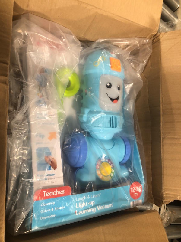 Photo 3 of Fisher-Price Laugh & Learn Toddler Toy Vacuum, Push Toy with Lights Music and Educational Songs, Light-Up Learning