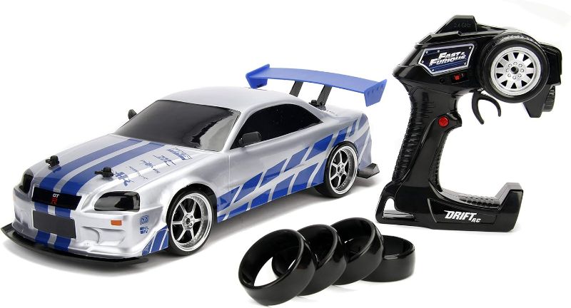 Photo 1 of 
Jada Toys Fast & Furious Brian's Nissan Skyline GT-R (BN34) Drift Power Slide RC Radio Remote Control Toy Race Car with Extra Tires, 1:10 Scale,...
Size:1:10 scale