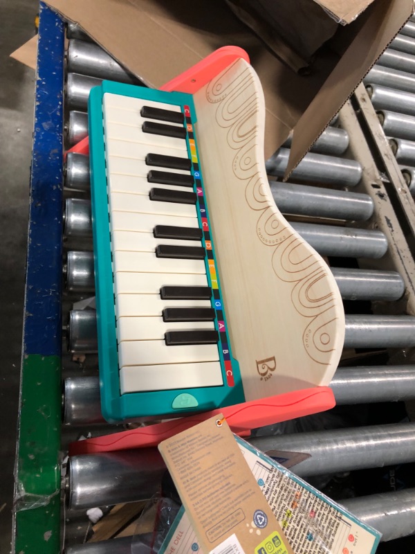 Photo 2 of B. toys wooden toy piano with songbook, piano wooden toy, music toy, musical instrument to learn to play the piano for children from 3 years old.