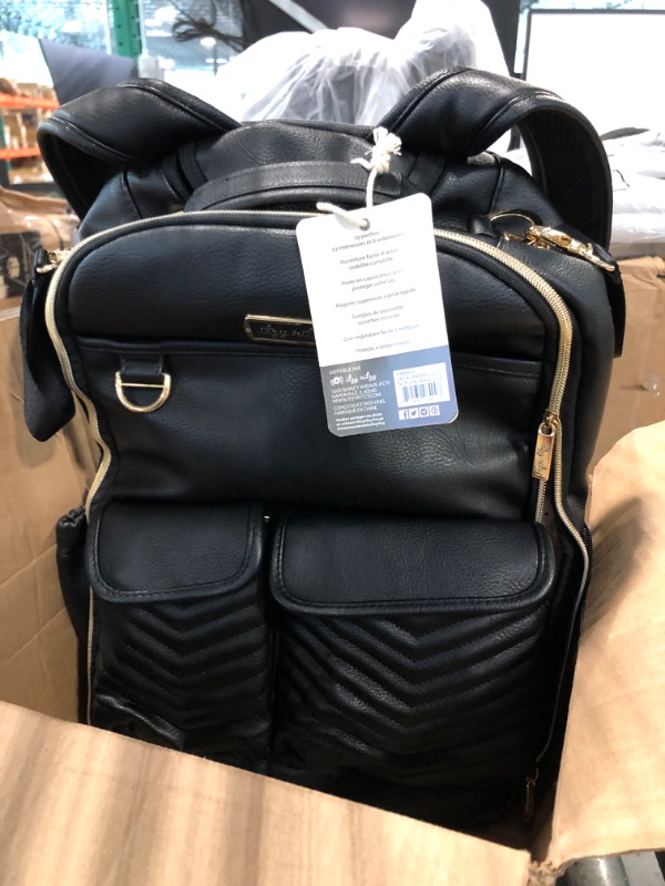 Photo 3 of Chelsea + Cole for Itzy Ritzy Diaper Bag Backpack - Studded Boss Backpack Diaper Bag Includes 19 Pockets, Changing Pad, Stroller Clips & Tassel; Black with Sweetheart Print Interior & Gold Hardware Black With Gold Hardware