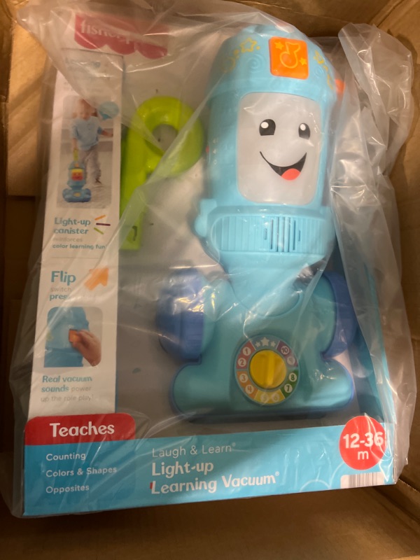 Photo 2 of Fisher-Price Laugh & Learn Toddler Toy Vacuum, Push Toy with Lights Music and Educational Songs, Light-Up Learning