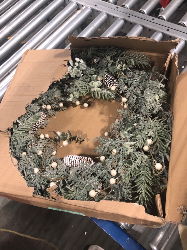 Photo 2 of LOHASBEE Artificial Christmas Wreath, 24" Pine Cone Grapevine Flocked Glitter Fir Wreath with White Berries for Christmas Home Front Door Hanging Wall Window Decor