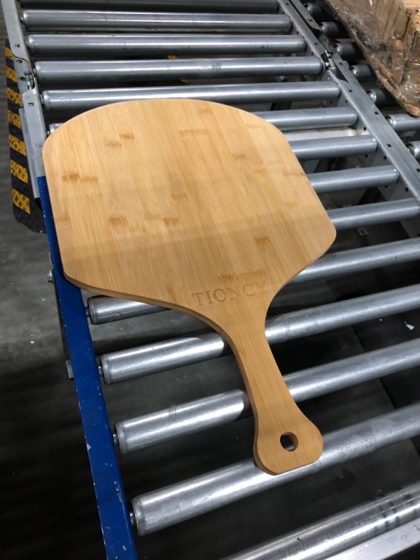 Photo 2 of Pizza Peel 16 Inch, Natural Bamboo Pizza Peel Pizza Paddle Spatula Oven Accessory for Large Wood Pizza Board For Transferring & Serving, Wood Pizza Cutting Board for Cheese Bread Fruit Vegetables