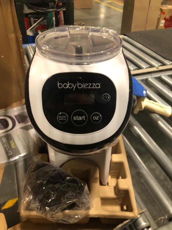 Photo 3 of Baby Brezza Formula Pro Mini Baby Formula Maker – Small Baby Formula Mixer Machine Fits Small Spaces and is Portable for Travel– Bottle Makers Makes The Perfect Bottle for Your Infant On The Go Formula Pro Mini Dispenser Machine