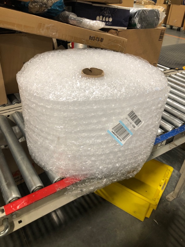 Photo 2 of Amazon Basics Perforated Bubble Cushioning Wrap - Medium 5/16", 12-Inch x 100-Foot Long Roll & Perforated Bubble Cushioning Wrap - Small 3/16", 12-Inch x 175-Foot Long Roll