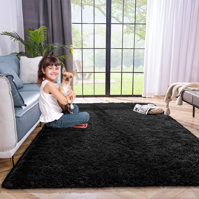 Photo 1 of 70X102" FUZZY BLACK RUG