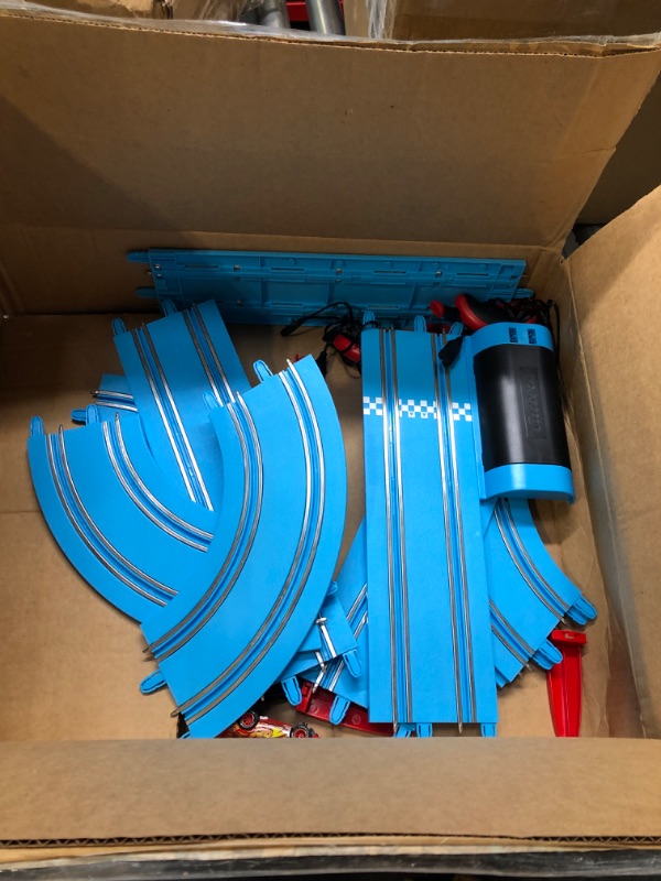 Photo 1 of Carrera First Disney/Pixar Cars - Slot Car Race Track - Includes 2 Cars: Lightning McQueen and Jackson Storm - Battery-Powered Beginner Racing Set for Kids Ages 3 Years and Up Disney Pixar Cars - Piston Cup