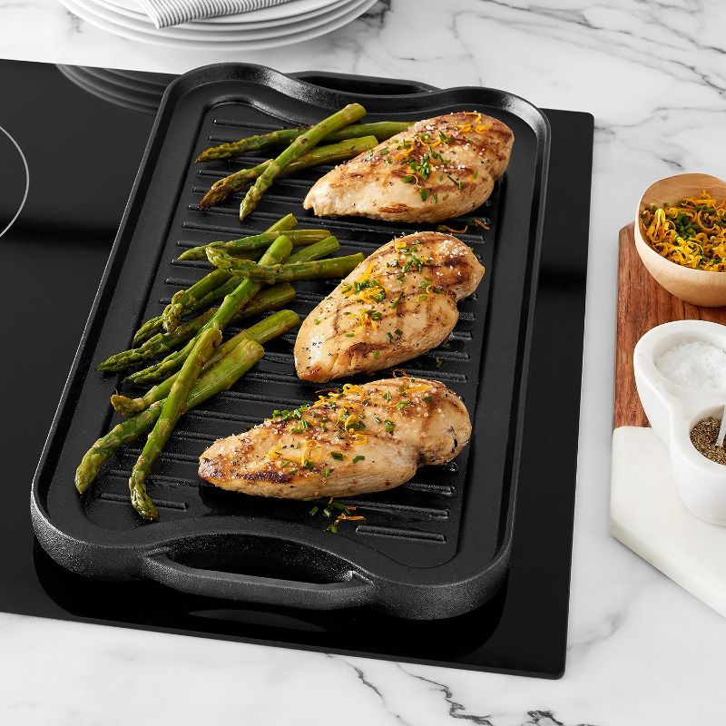 Photo 1 of Amazon Basics Pre-Seasoned Cast Iron Reversible Rectangular Grill/Griddle, Black, 20 x 10.39 x 0.98 inch