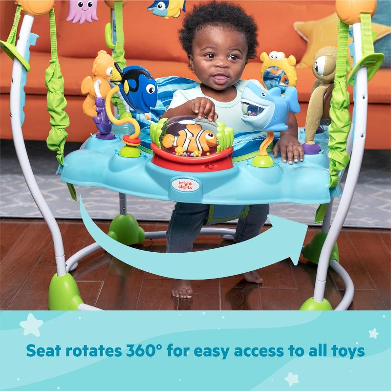 Photo 1 of Bright Starts Disney Baby Finding Nemo Sea of Activities Baby Activity Center Jumper with Interactive Toys, Lights, Songs & Sounds, 6-12 Months (Blue)