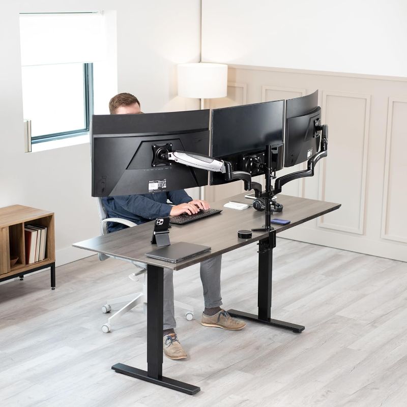 Photo 1 of VIVO Triple Monitor Height Adjustable Desk Mount, 2 Pneumatic Arms, 1 Fixed, Counterbalance Stand, 17.6 lbs Weight Capacity per Screen, Max VESA 100x100, Fits up to 32 inch Screens, Black, STAND-V300G