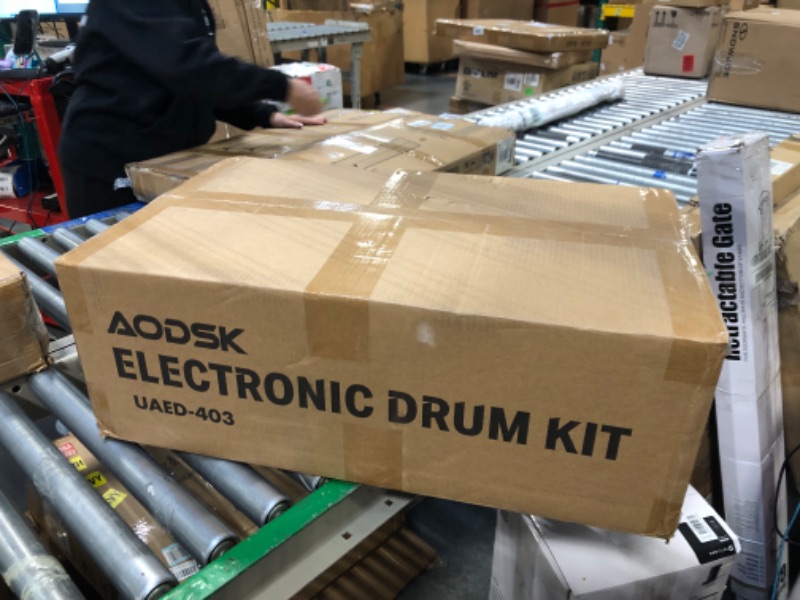 Photo 2 of AODSK Electric Drum Set,Electronic Drum Kit for Kids with 195 Sounds,Mesh Drum Pads,Drum Sticks,Heavy Duty Pedals,Drum Throne,Sticks Headphone Included,Light & Portable