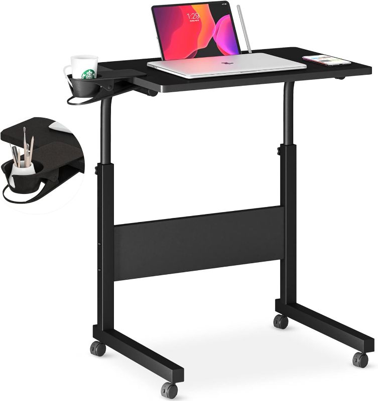 Photo 1 of Klvied Standing Desk Adjustable Height, Stand Up Desk with Cup Holder, Portable Laptop Desk, Mobile, Small Computer Desk, Bedside Table, Black Rolling Desk, Work Desk for Home Office
