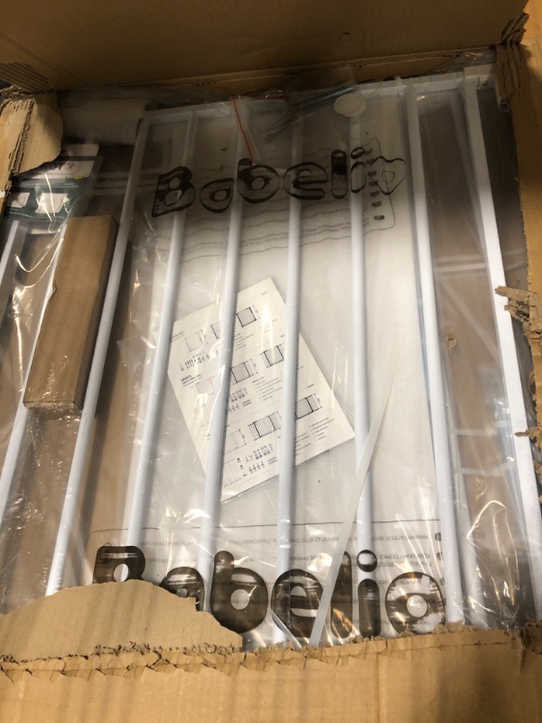 Photo 1 of BABELIO Metal Baby Gate Dog Gate 29-48 Inch Extra Wide Pet Gate for Stairs & Doorways, Pressure Mounted Walk Thru Child Gate with Door, NO Need Tools NO Drilling, with Wall Cups White 29-48 Inch (Pack of 1)