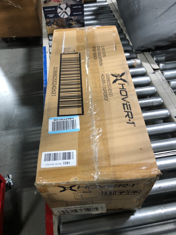 Photo 1 of Hover-1 Superfly Electric Hoverboard, 7MPH Top Speed, 6 Mile Range, Long Lasting Li-Ion Battery, 5HR Full Charge, Built-In Bluetooth Speaker, Rider Modes: Beginner to Expert, Black
