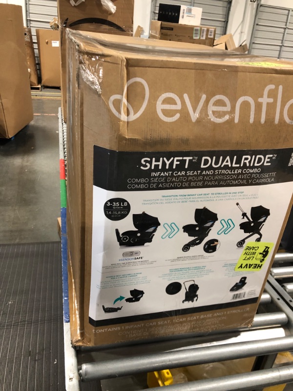 Photo 2 of Evenflo Shyft DualRide Infant Car Seat and Stroller Combo with Carryall Storage (Durham Green) Shyft Dualride Durham Green