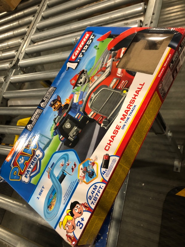 Photo 1 of Carrera First Paw Patrol - Slot Car Race Track - Includes 2 Cars: Chase and Marshall - Battery-Powered Beginner Racing Set for Kids Ages 3 Years and Up, Multi