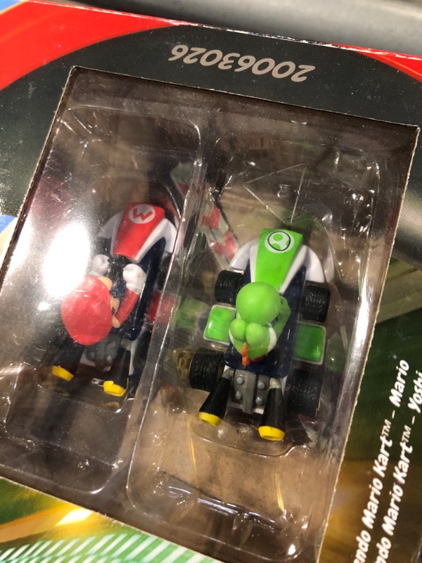 Photo 3 of Carrera First Mario Kart - Slot Car Race Track With Spinners - Includes 2 Cars: Mario and Yoshi - Battery-Powered Beginner Racing Set for Kids Ages 3 Years and Up Mario Kart w/ Spinners