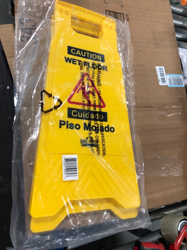 Photo 2 of Nine Forty No-Pinch Handle Commercial Caution Wet Floor Sign | Sturdy and Durable Yellow 2-Sided Fold-Out A-Frame Design | Bilingual Message - 24" Height | Ideal for Indoor and Outdoor Use | Pack of 2 2 pack