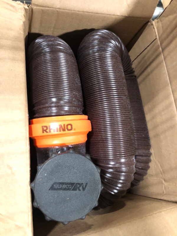 Photo 3 of Camco RhinoFLEX RV Sewer Hose Kit with Swivel Transparent Elbow and 4-in-1 Dump Station Fitting, Brown, 15 Feet (39770) 15ft Sewer Hose Kit Frustration-Free Packaging