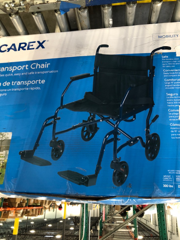 Photo 2 of Carex Transport Wheelchair With 19 inch Seat - Folding Transport Chair with Foot Rests - Foldable Wheel Chair for Travel and Storage, 1 Count