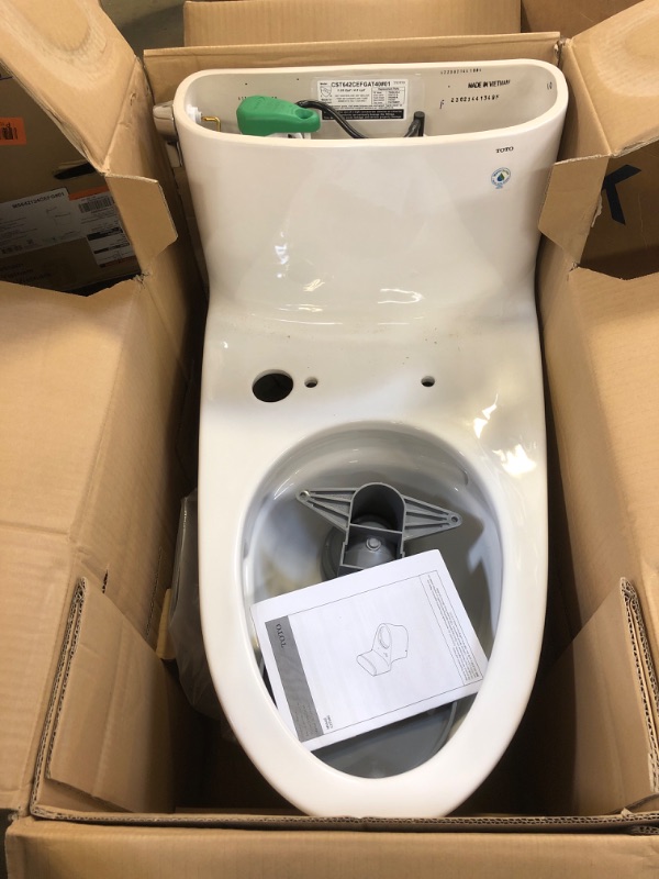 Photo 2 of TOTO TMS642124CEFG01 Nexus 1.28 GPF One Piece Elongated Chair Height Toilet with Tornado Flush Technology - Seat Included Cotton White